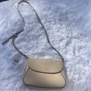 kate spade Pebbled Leather Crossbody in Light Beige with Dark Trim